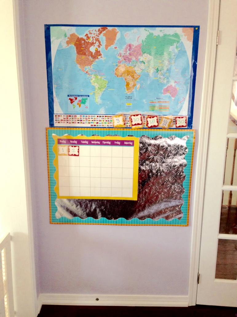 Map of the World and our monthly counting calendar.